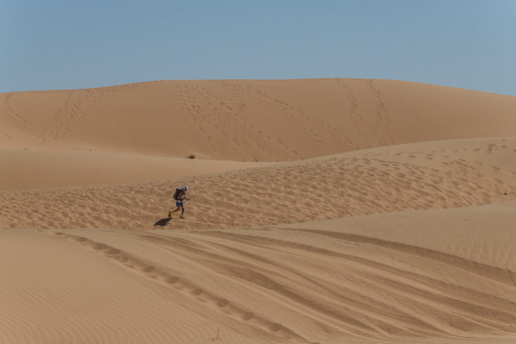 Image for An amputee runs a grueling ultra-marathon in the desert; a reporting team chases along