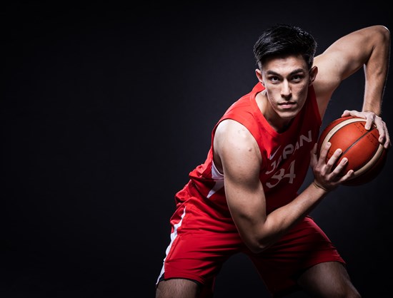 Japanese-American Hugh Watanabe playing on the Japanese Olympic basketball team