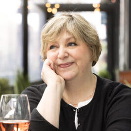 Canadian magazine editor and cookbook author Joanne Sasvari enjoying a glass of rose wine