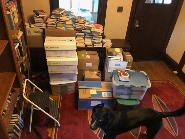 Books stacked for a give-away by Minnesota book reviewer Laurie Hertzel