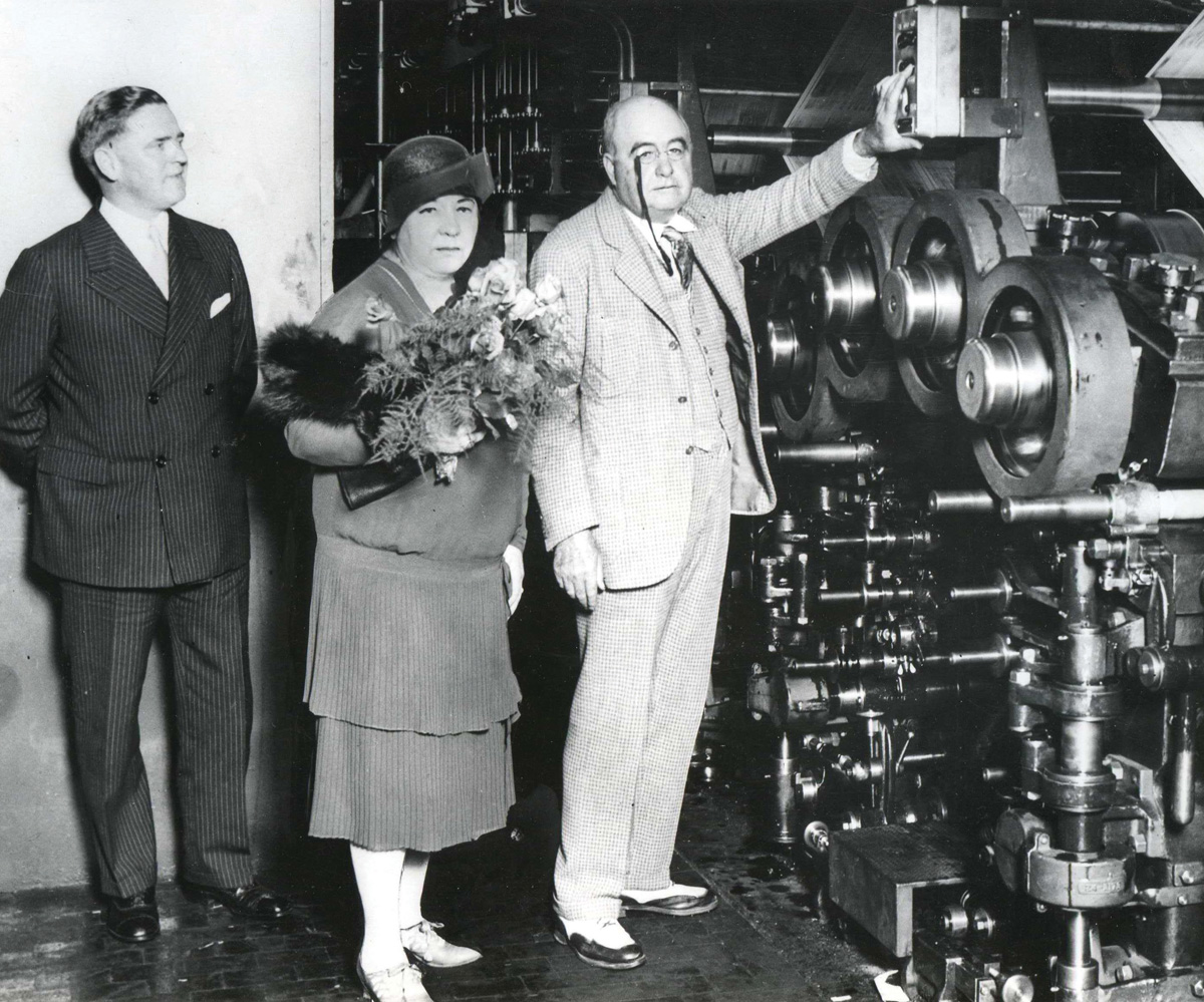 Lucius Nieman, editor of The Milwaukee Journal, turns on the paper’s new printing press alongside his wife, Agnes, and Journal publisher Harry J. Grant. This is the only known photograph of Lucius and Agnes together. The Journal moved into its new office in 1924 