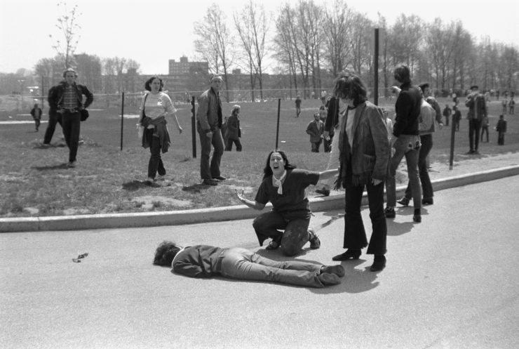 Mary Ann Vecchio screams as she kneels over the body of fellow student Jeffrey Miller during an anti-war demonstration at Kent State University, Ohio, May 4, 1970. Four students were killed when Ohio National Guard troops fired at some 600 anti-war demonstrators. A cropped version of this image won the Pulitzer Prize. 