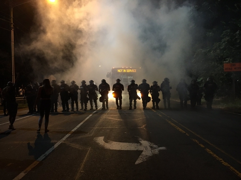 Reporter Adam Rhew took this photo of the unrest, which went viral after he posted it on Twitter.
