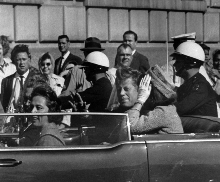 President John F. Kennedy is seen riding in motorcade approximately one minute before he was shot in Dallas on Nov. 22, 1963.  