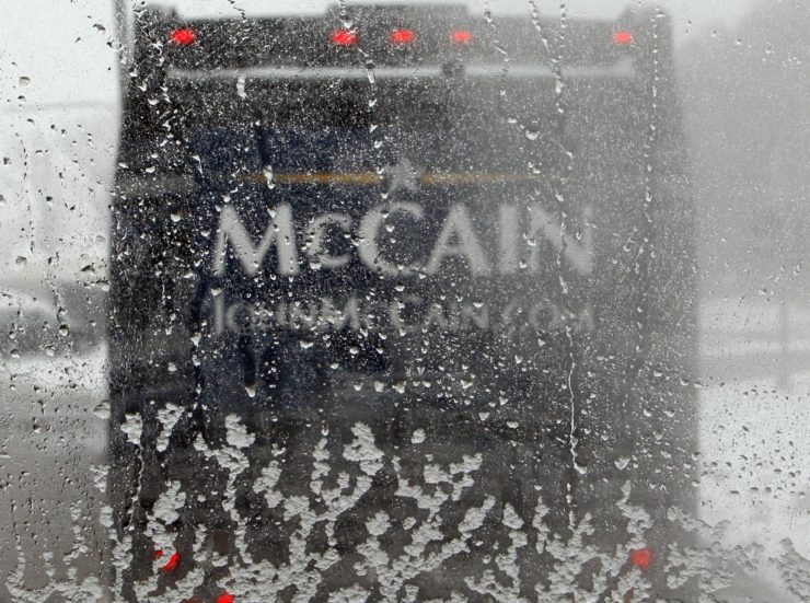 In this photo taken during John McCain's second attempt to win the presidency, his "Straight Talk Express" campaign bus travels through snow in Michigan. David Foster Wallace called the press bus "Bullshit 1."
