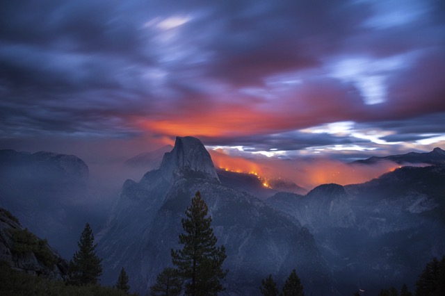 Dawn breaks as the Meadow Fire lights the forest and clouds to the northwest of El Capitan Peak in Yosemite National Park, Calif.
3:13am. 30 seconds with 24mm lens @f.4
