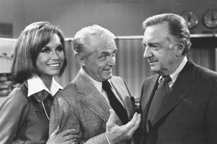 Mary Tyler Moore and Ted Knight meet with Walter Cronkite as he makes an appearance at the "Mary Tyler Moore Show" in 1974.   