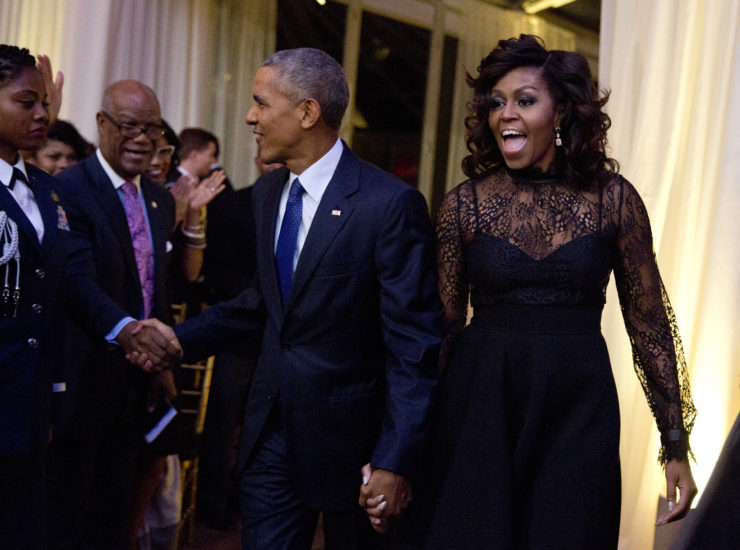 The president and first lady arrive at the BET event in October.