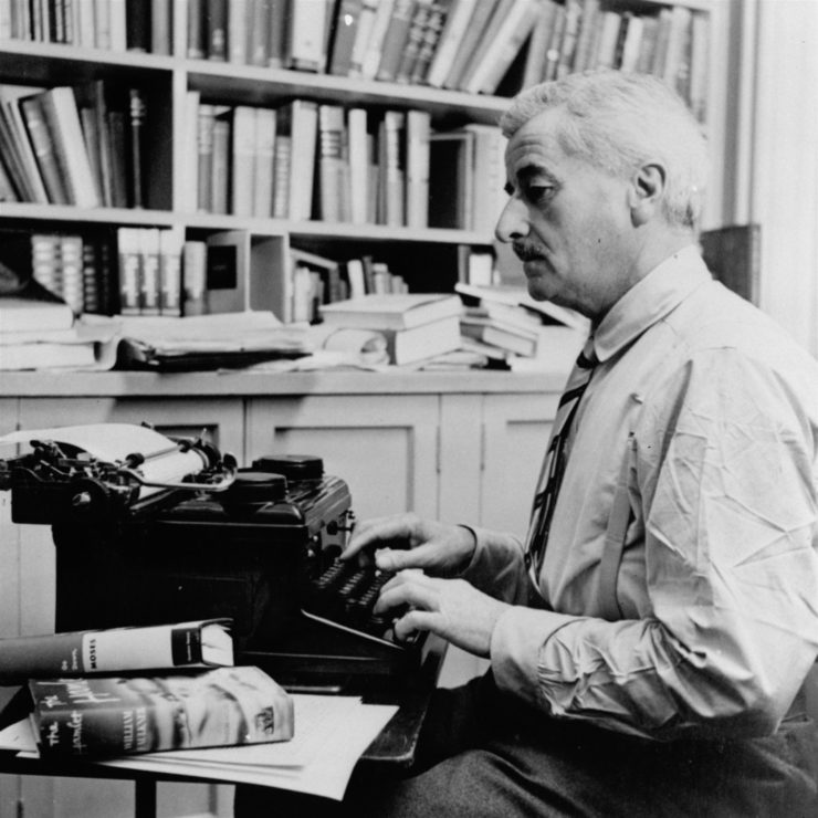 William Faulkner at work at his typewriter in 1954. 