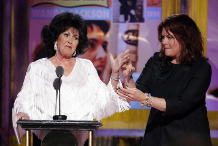 Wanda Jackson, left, is inducted into the 2009 Rock and Roll Hall of Fame in 2009.. At right is Rosanne Cash.