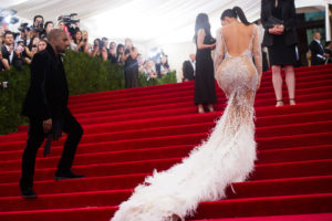 Kanye West and Kim Kardashian, who is wearing Eric Charles-Donatien's feathers, arrive at The Metropolitan Museum of Art's Costume Institute benefit gala in 2015.