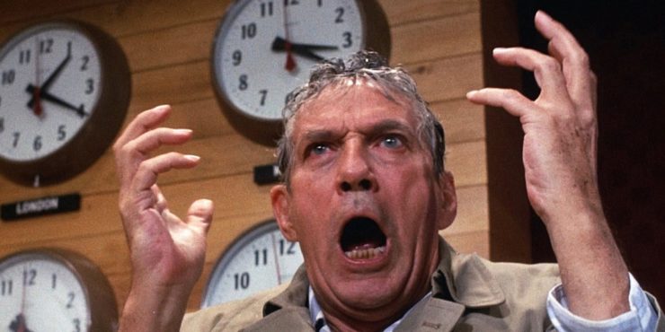 Peter Finch as Howard Beale in the famous "mad as hell" scene from "Network."