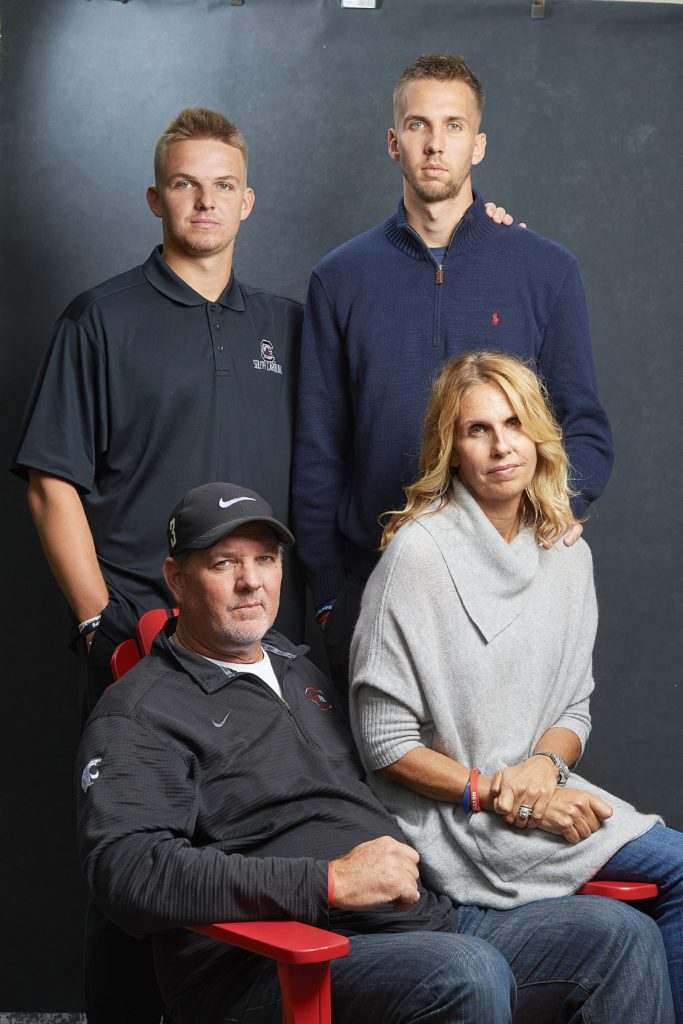 Tyler Hilinski's family: Brothers Ryan and Terry standing, parents Mark and Kym seated