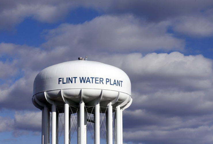 The water tower in Flint, Mich., where 100,000 residents battled for more than three years to get government officials to start to take steps to replace lead-leaching pipes.