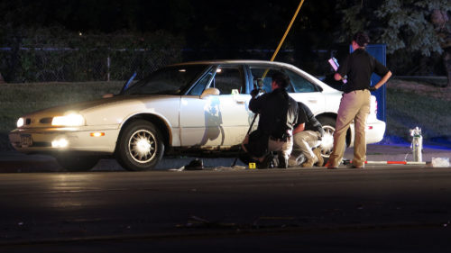 Investigators on the scene of the police shooting of Philando Castile in Falcon Heights, Minn., on July 7, 2016.