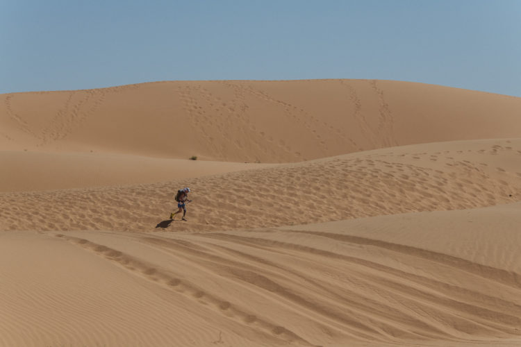 Amy Palmiero-Winters navigates sand dunes during day two of the Marathon des Sables, a 140-mile, six day ultramarathon through the Sahara Desert in Morocco, April 8, 2019. Palmiero-Winters, who lost part of her leg after a 1994 motorcycle accident, holds many records or firsts for below-the-knee amputees. But the forbidding Sables would be perhaps her harshest test.
