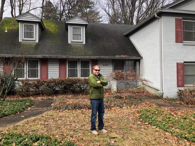 Former Russian intelligence officer Jan Neumann took this photo of author Bryan Denson at the Arlington, Va., house formerly owned by CIA officer and Russian spy Aldrich Ames. Ames was the subject of Denson's second book in The FBI Files, a series for middle grade readers.