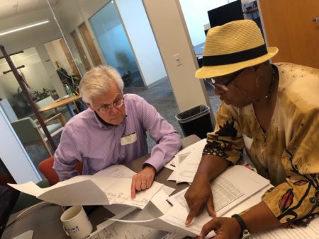 USA Today reporter Rick Hampson with Wanda Tucker, researching records of Tucker's ancestry