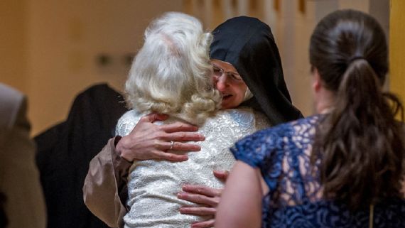 Sister Rose Marie hugs her mother, Mary Jane Pennefather, for the first time in 25 years. Pennefather was a star college basketball player who walked away to join a cloistered religious order