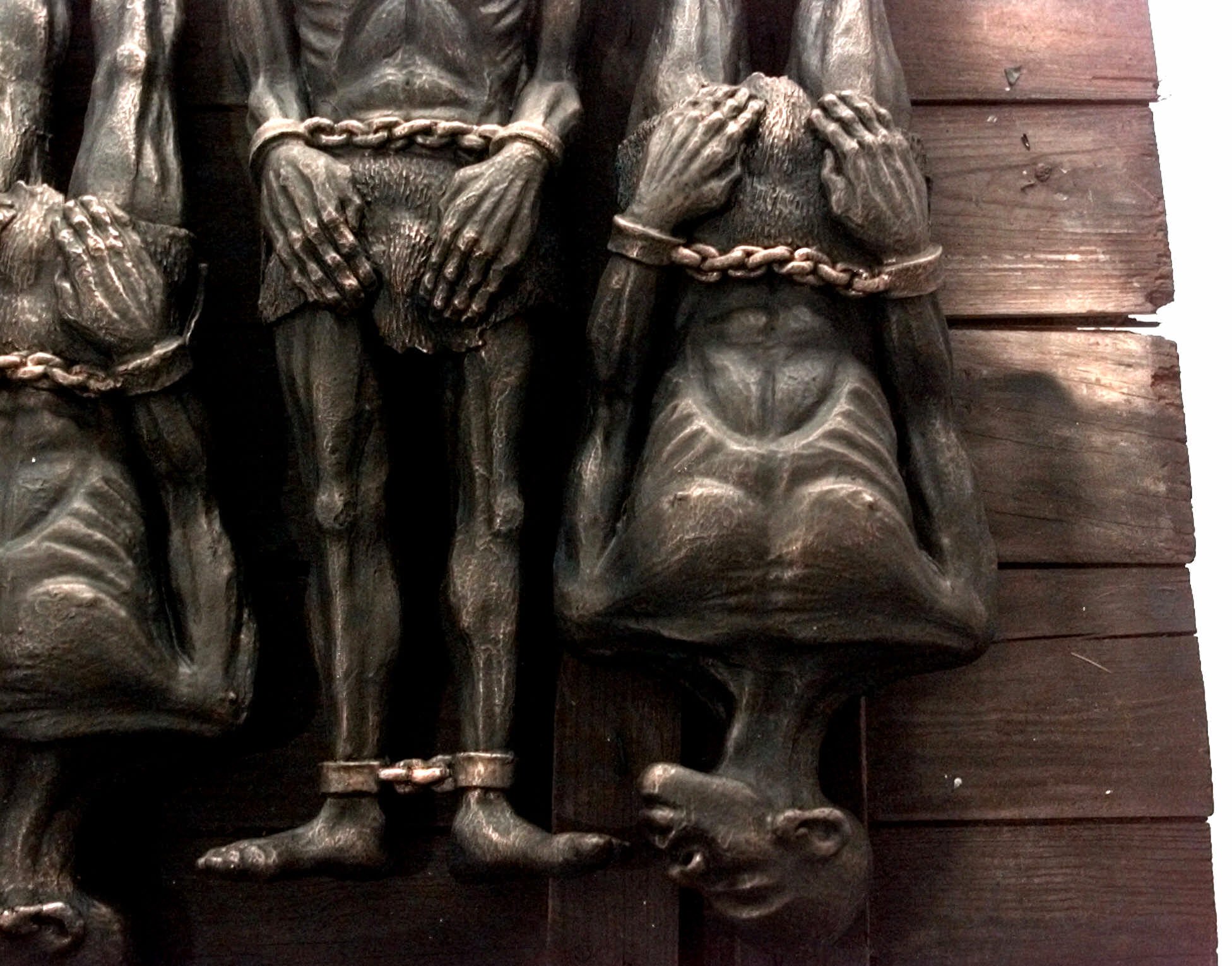 Bronze sculptures of chained slaves by sculptor Bernard Jackson in South Orange, N.J., in 2000.
