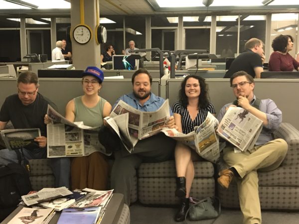 Vindicator reporters in the Vindicator's newsroom on the final production night of the paper.
