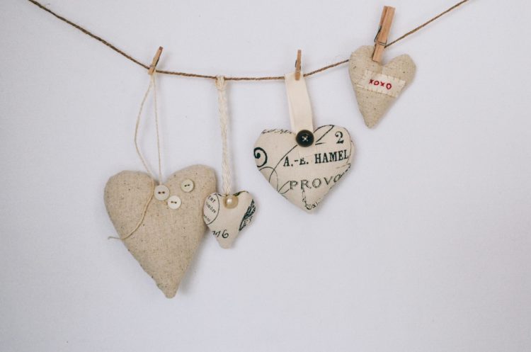 Hand-sewn hearts attached to a string.