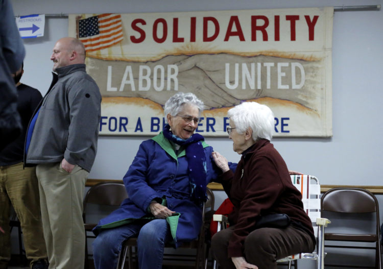 Voters gathered at precinct caucuses in Dubuque, Iowa.
