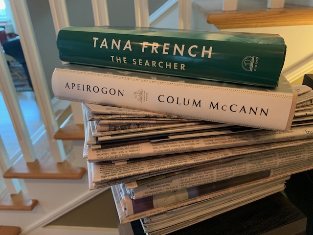 Books on a stack of newspapers