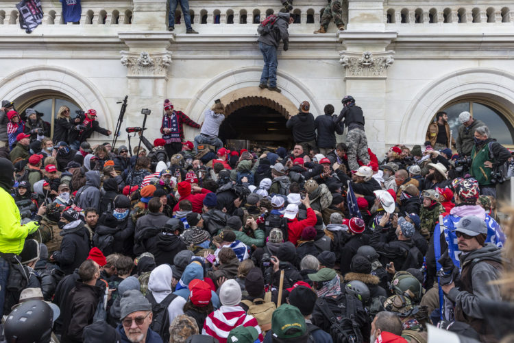 Rioters attacking the U.S. Capitol Wednesday, Jan. 6, 2020
