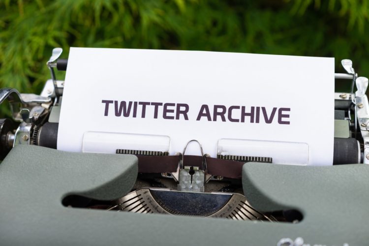 Typewriter with paper that says "Twitter Archive"