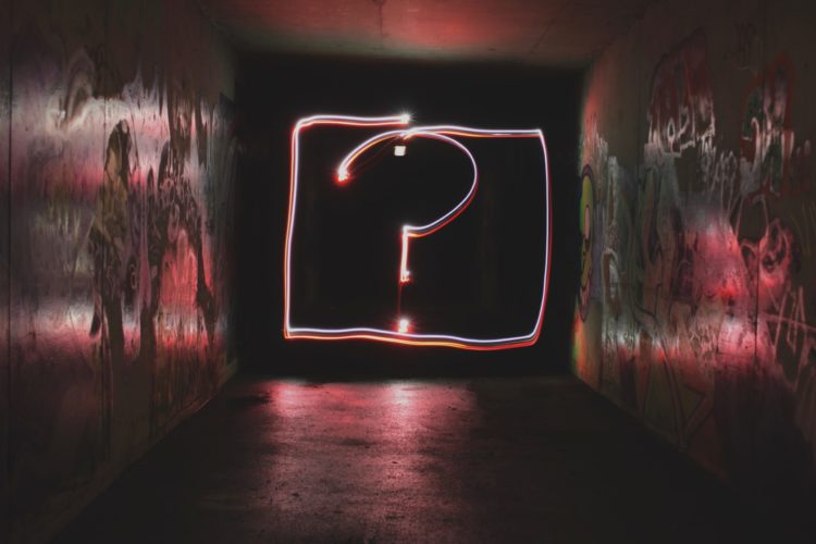 Neon sign of question mark