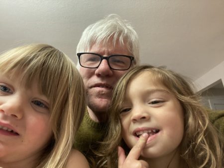Pulitzer Prize winning writer Tom French with his youngest daughters, Brooke and Greysi