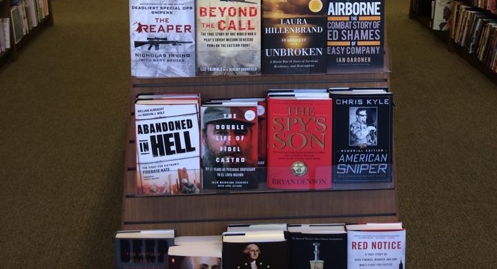 Bookstore shelf that includes "The Spy's Son"