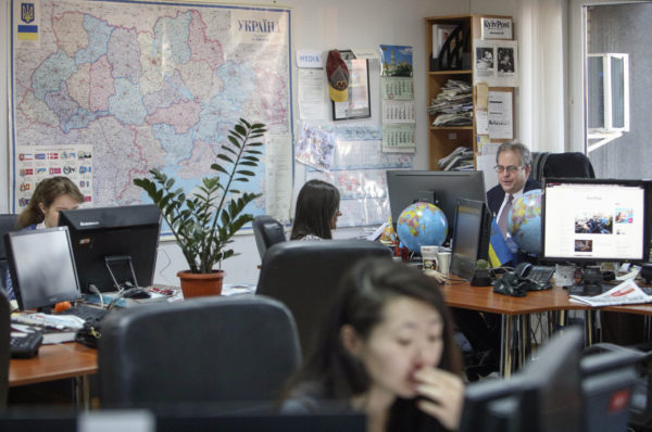 Brian Bonner and his staff in the newsroom of the Kyiv Post in 2017