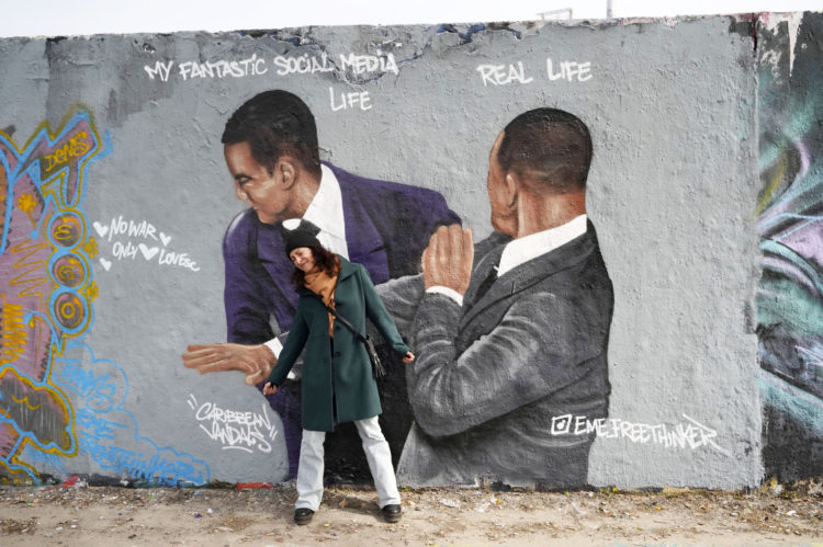 Graffiti mural in Berlin, Germany, of the Oscar slap by Will Smith on Chris Rock