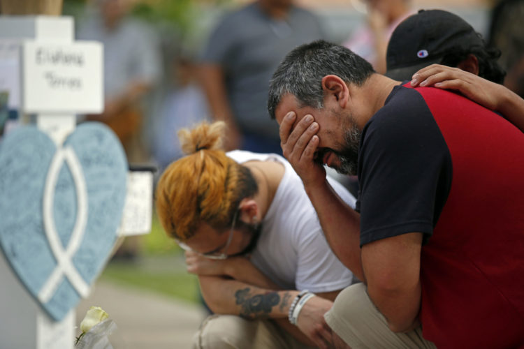A man grieves his daughter, who was killed in a mass shooting May 24, 2022, an elementary school in Uvalde, Texas