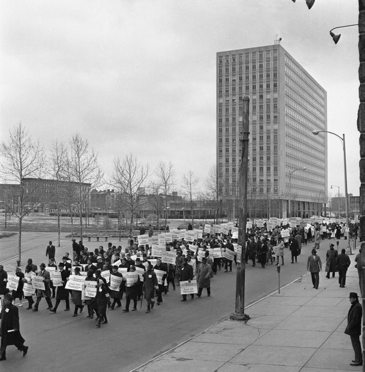 Hundreds of persons marched through downtown Baltimore, March 30, 1964 in a demonstration for racial equality.