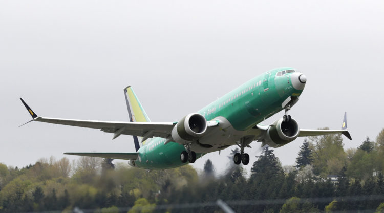 A Boeing 737 Max airplane taking off in a test flight from Boeing Field in Seattle in 2019.
