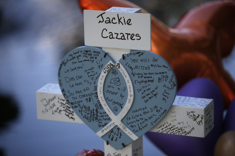 Jackie Cazares' cross stands at a memorial site for the victims killed in the May 24, 2022, shooting at Robb Elementary School in Uvalde, Texas, Friday, May 27, 2022.