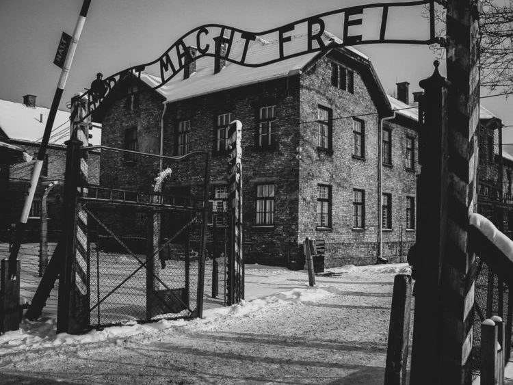A photo of the entry gates into the Auschwitz concentration camp in Poland.