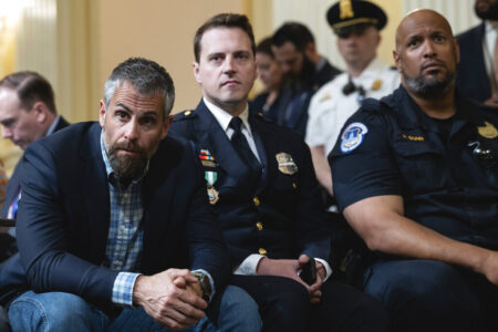 Retired Washington Metropolitan Police Officer Michael Fanone and two other officers at a hearing of the congressional hearing that investigated the Jan. 6 U.S. Capitol riots.