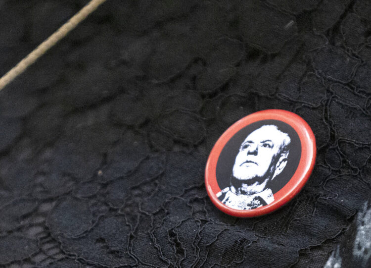 A lapel pin worn by a county official in Nevada, honoring slain Las Vegas Review-Journal reporter Jeff German, worn during  the arraignment of German's accused murderer.
