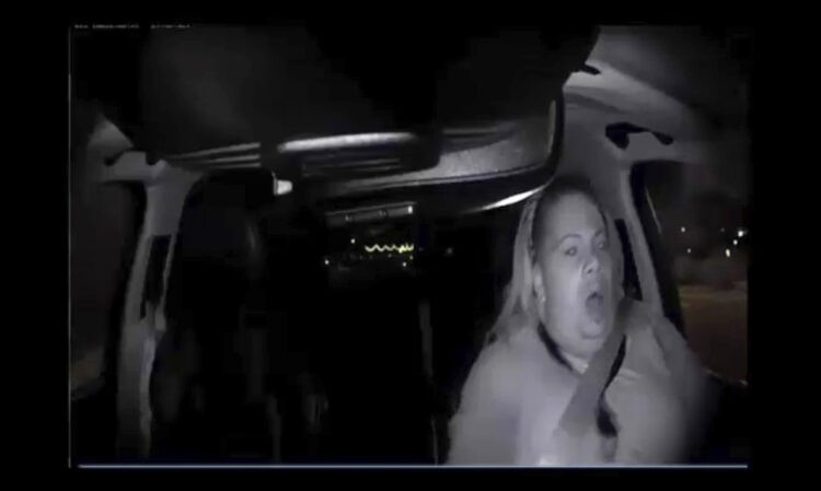 A screen grab from the video camera mounted inside a self-driving Uber just before the SUV fatally struck a bicyclist in Tempe, Ariz., on March 18, 2018.