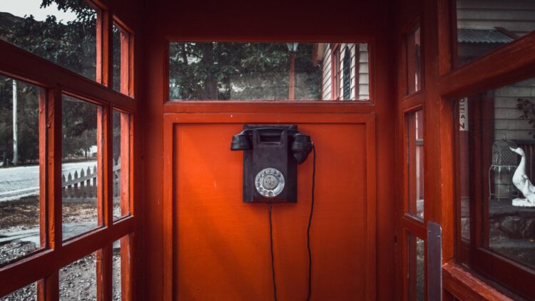Interior of an old phone booth.