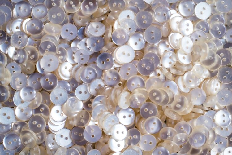 Photo of a pile of white buttons