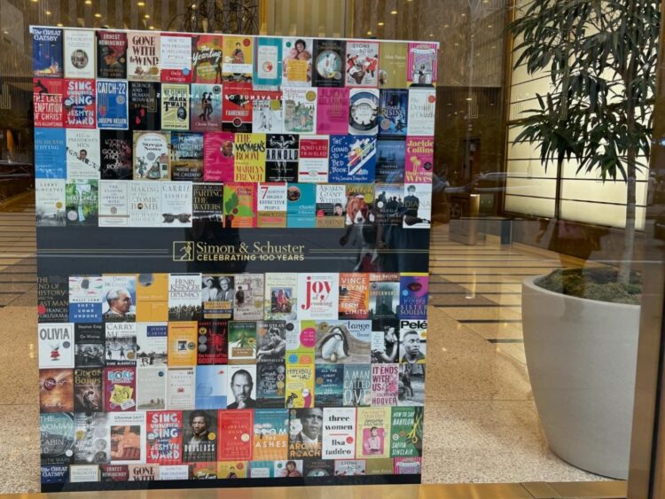 Photo of book covers on display at the Simon & Schuster publishing headquarters in New York City