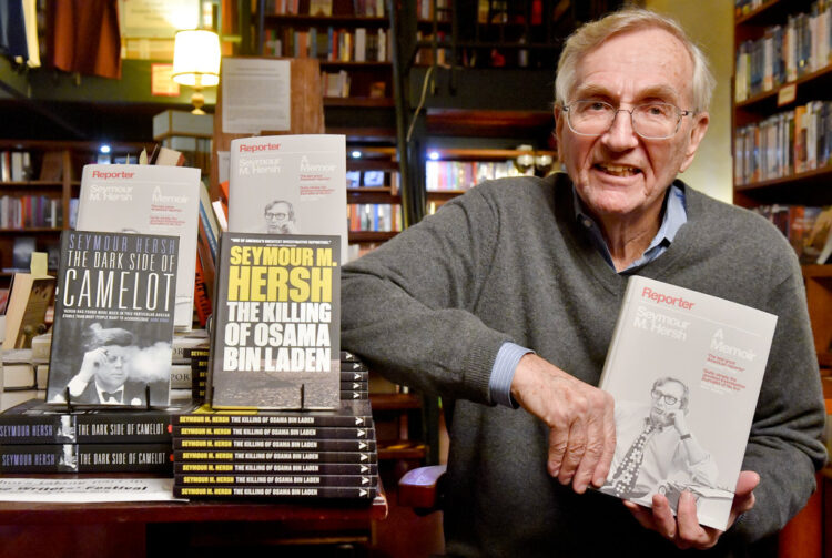 Pulitzer Prize winning journalist Seymour Hersh in 2018 with a copy of his memoir "Reporter"