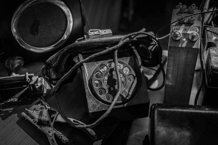 An old fashioned telephone in pieces